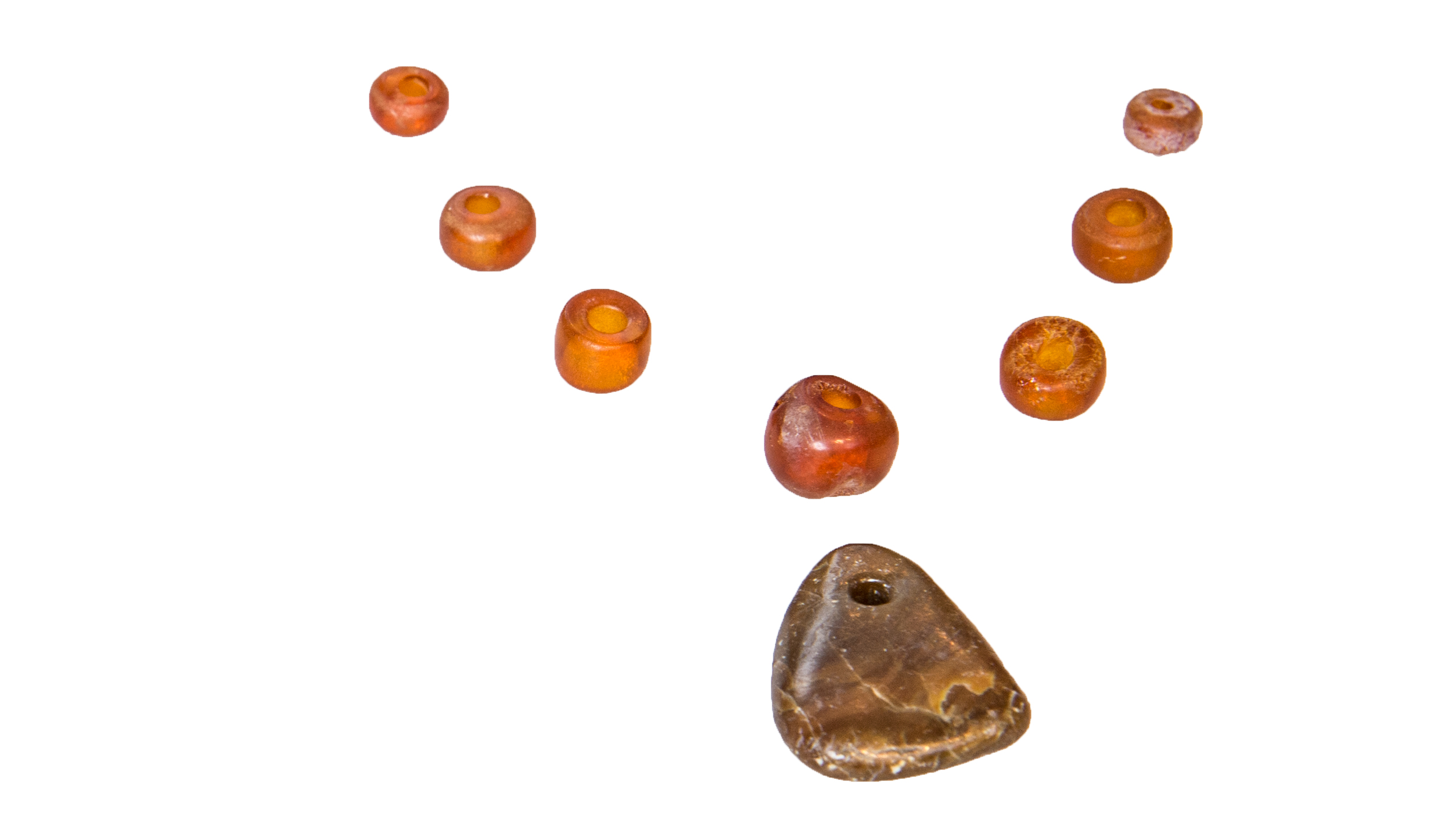 amber stones that form the shape of a necklace