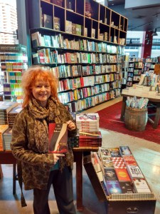 author holding copy of The Crystal Ballroom