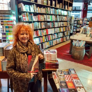 Libby Sommer with her book The Crystal Ballroom in book store